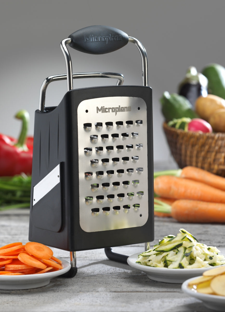 The Microplane Professional Box Grater provides ultimate versatility in the kitchen. The Box Grater features 4 blades.