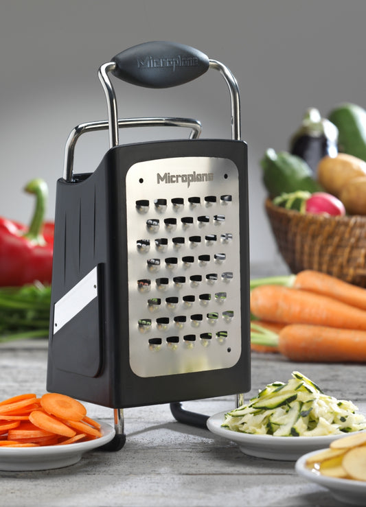The Microplane Professional Box Grater provides ultimate versatility in the kitchen. The Box Grater features 4 blades.